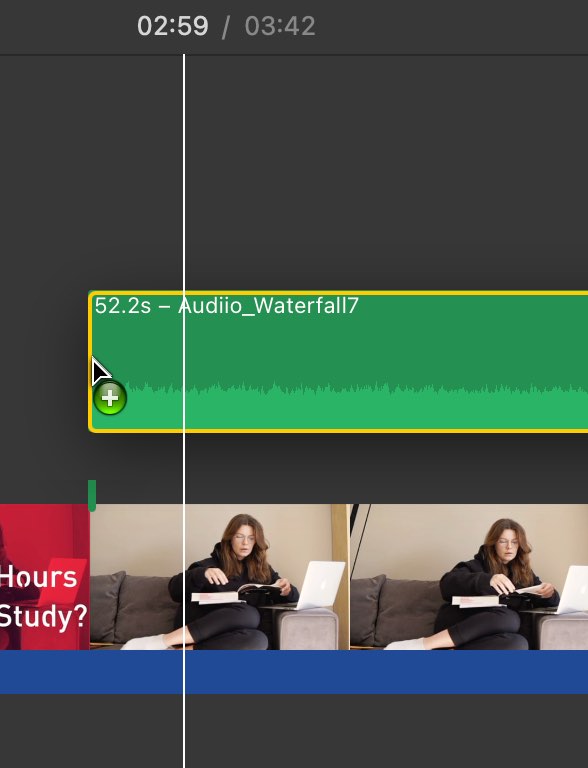 You can add an audio clip at a specific part of your iMovie project